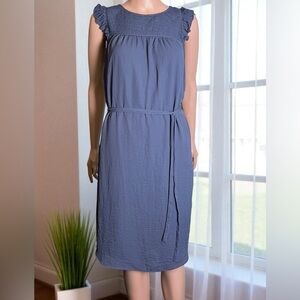 H & M Blue/Slate Dress. Smocked detail at the neckline, Ruffle Sleeves. Size 6